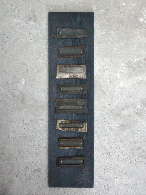 Imprint, 2013,  Teerpappe, Eiche geflammt, 18 x 70 cm